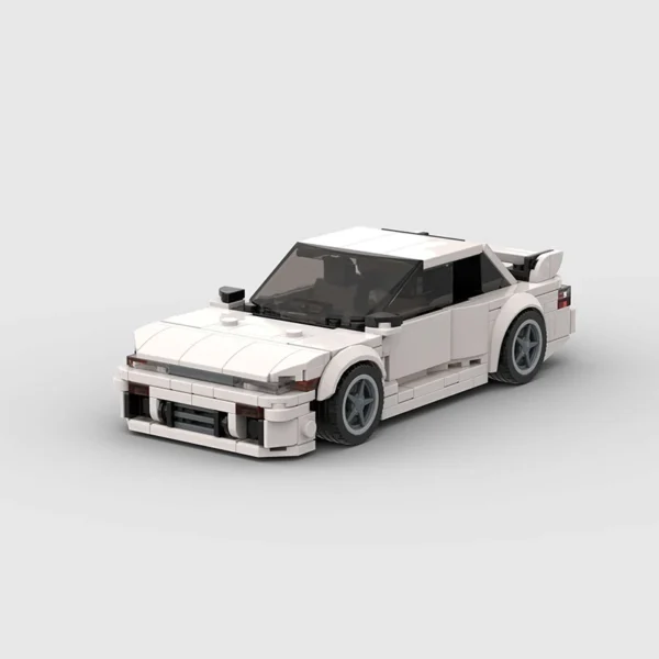 Voiture de course blanche en briques de construction, vue de face avec design réaliste et lignes profilées.