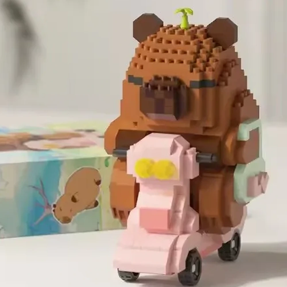 Capybara en briques avec scooter rose