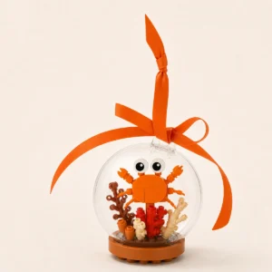 Crabe Orange en Briques sous Globe